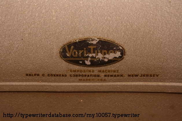 The rear logo is chipped, but the gold lettering is still legible and declared this machine to be a "Composing Machine".