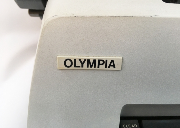 Olympia "SG3" logo badge...
