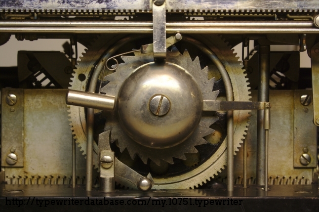 Instead of using a drawstring like nearly every other typewriter, this machine has a very simple direct drive system comprised of one giant gear attached directly to the escapement wheel.