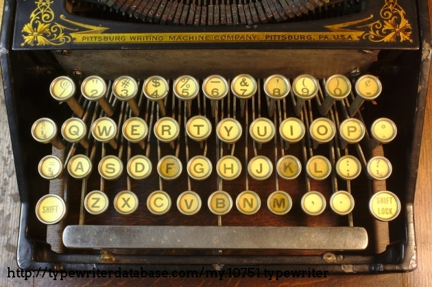 Glass and discolored paper inserts, a hallmark of very old typewriters. The spacebar is a fabulously nickel plated!