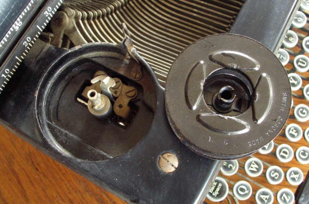 The proprietary L.C. Smith ribbon spool, made to accommodate their ribbon-reversing mechanism.
