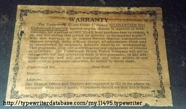 Warranty label inside top carrying case cover