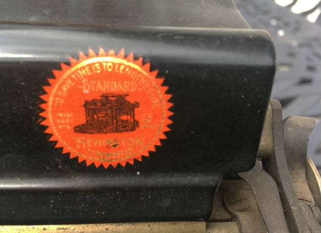 1909 Remington "12" logo from the top (detail)...