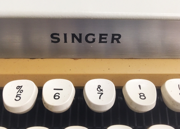 Singer "Professional" logo, from above the keyboard...