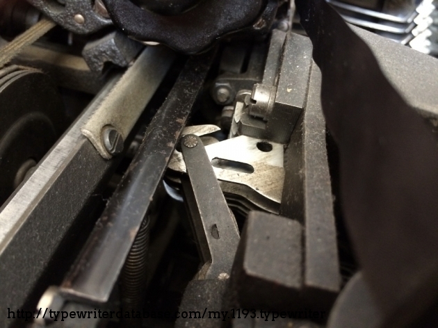 Mechanical weirdness: This is the weird joint between the type lever and the typebar.