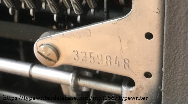 Serial number is stamped underneath the machine on the rear right