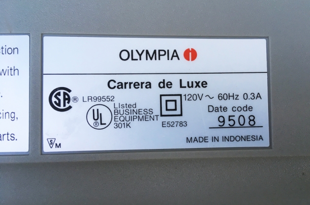 Olympia "Carrera de Luxe" date code tag...