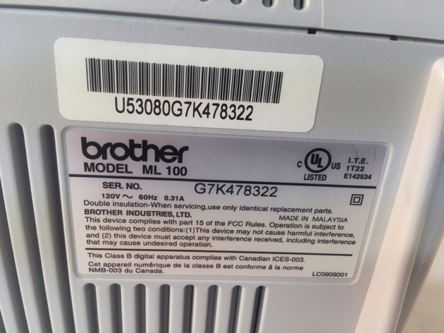 Brother "ML 100" serial number location...
