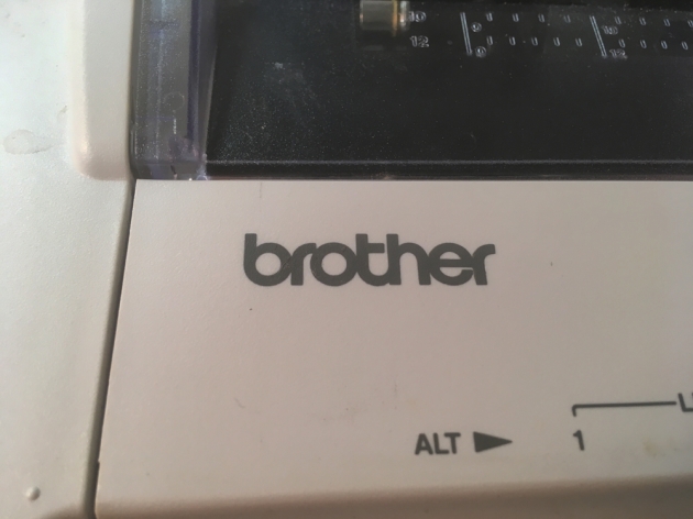 Brother "ML 100" logo on the front (left)...