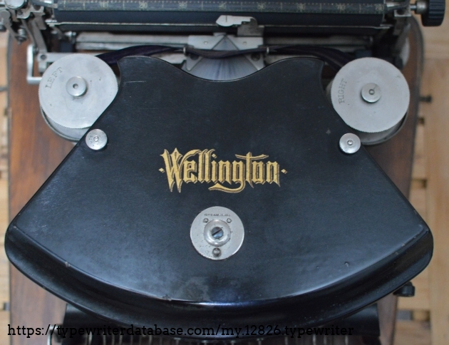 Wellington  decal  on  hood and ribbon spools marked Left and Right