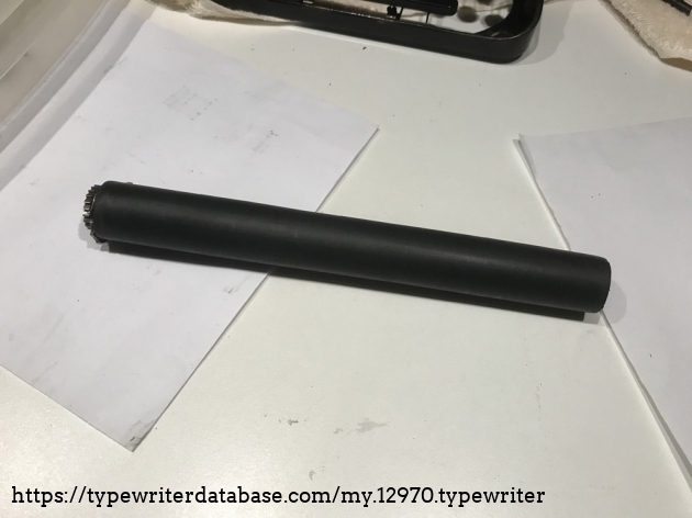 Removed cracked platen and replaced with layers of commercial grade polyolefin heat shrink tubing, 3:1 heat shrink tubing (Pre Shrink OD:1-1/2")