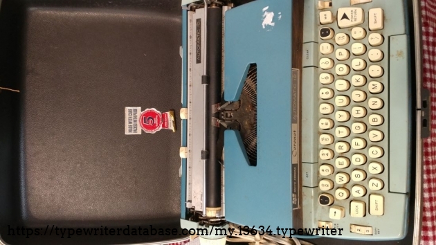 Typewriter in original carrying case.