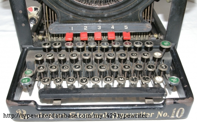 Closer view of the keyboard.  A previous owner painted the tabular keys red, which adds to the character!