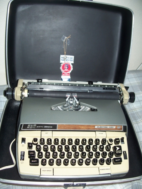 Typewriter in its case, ready for action.