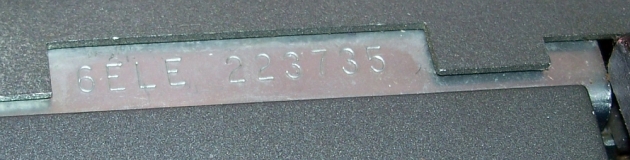 The serial. I had to guess 1970-or-so due to the keyboard colors sinec the 6ELE series isn't mentioned in the TWDB. Location is on the bottom where your right hand fingers were when you flipped the machine over.