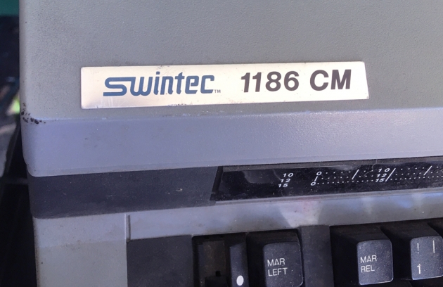 Swintec "1186 CM" form the logo on the top...