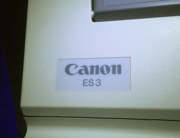 Canon "ES 3" from the log on the front...