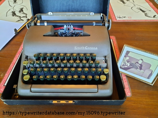 Dad's "new" typewriter next to a photo of him the year it was made.