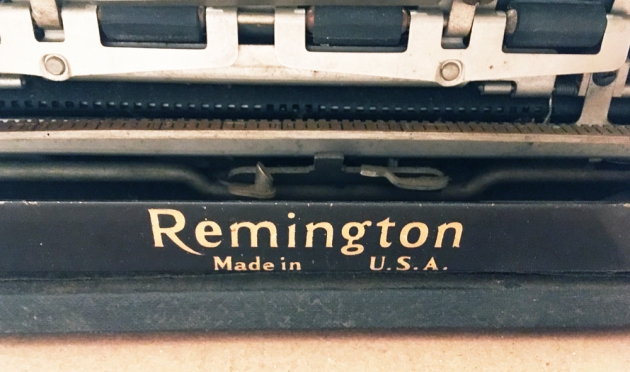 Remington "Portable 5"  from the logo on the back...