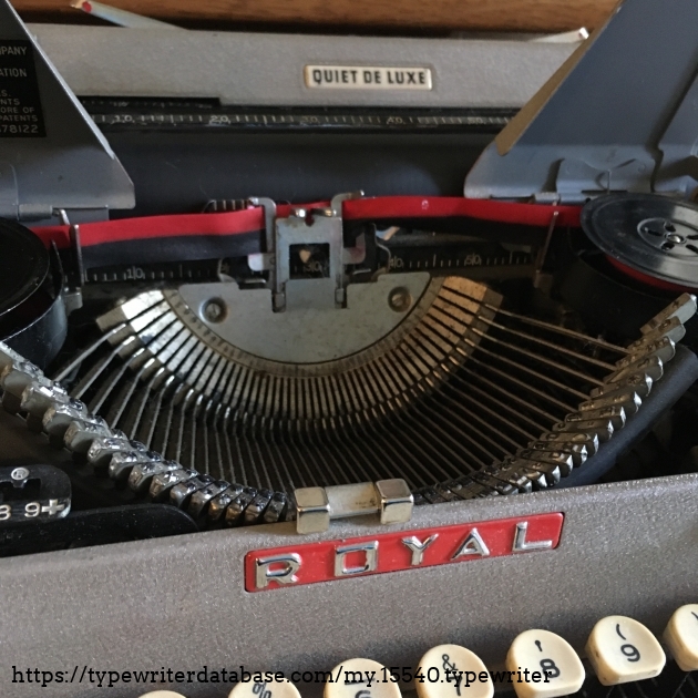 Inside of machine and Royal logo near keyboard.