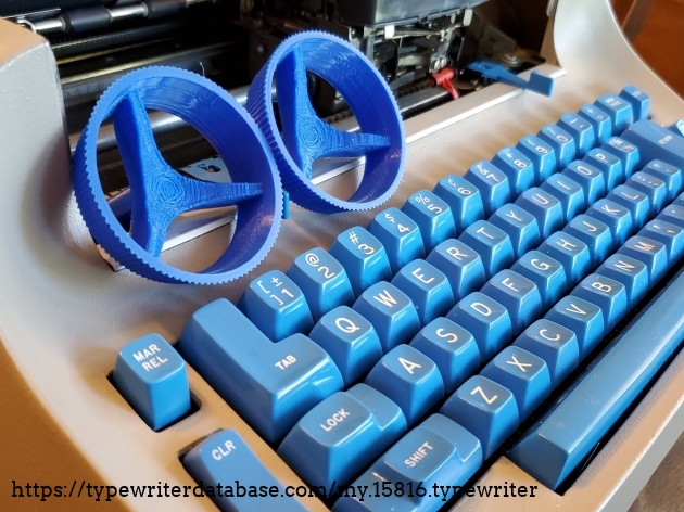 Pair of 3D printed knobs from ebay. Blue is a little darker, and there are a number of printing artifacts on the knob, but they look okay, considering.