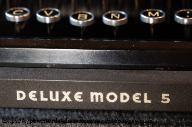 Deluxe Model 5 decal in front of the spacebar.