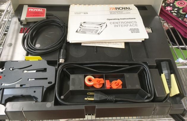 Royal "Alpha 620C"  from the tray under the lid with power cord, extra ribbon, two manuals, centronics cable...