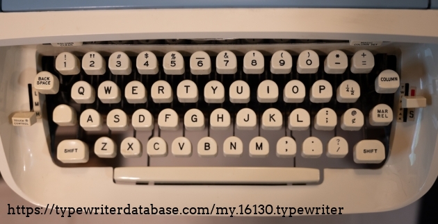 Top down view of the keyboard, which includes 1/! and +/= buttons. Touch control on the left, ribbon position selector on the right. "Column" is the tab key. Top down view of the keyboard, which includes 1/! and +/= buttons. Touch control on the left, ribbon position selector on the right. "Column" is the tab key.