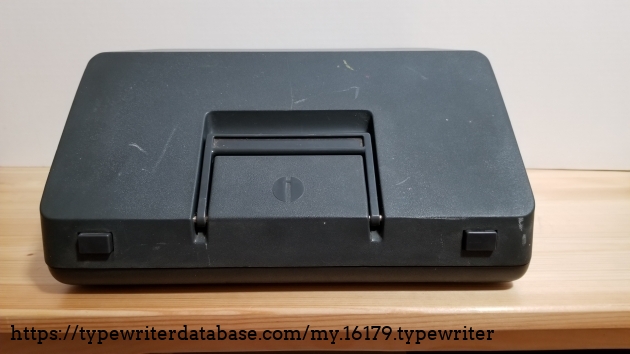 Plastic molded cover that fits right on the typewriter for carrying it around.