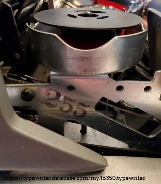 "255" is stamped on the right side under the ribbon reel.