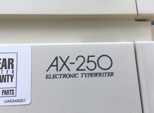Brother "AX-250" from the logo on the right side of the keyboard...