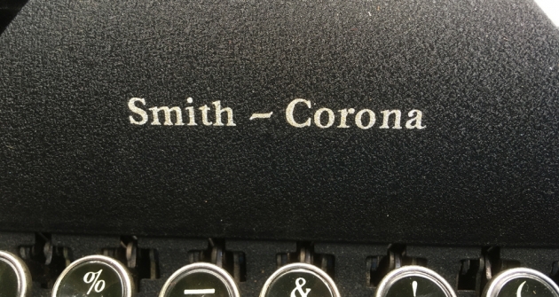 Smith Corona "Silent" logo from the front of the hood...