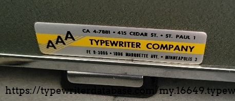 Local typewriter company label on side.