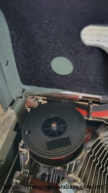 Close-up of left ribbon spool and soundproofing under the cover.