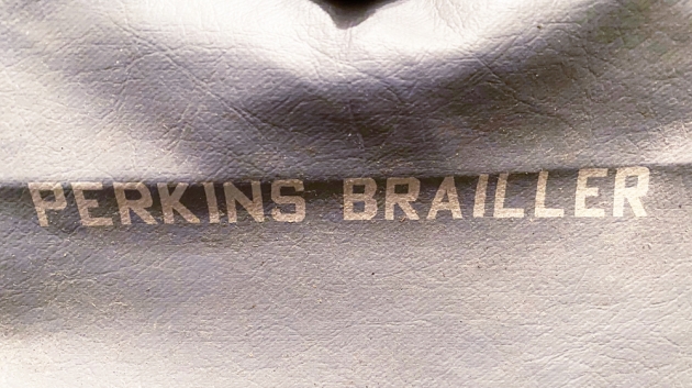 Perkins "Brailler" from the logo on the dust cover/cary case...