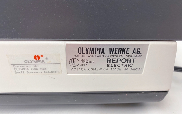 Olympia "Report Electric" from the badge on the back...