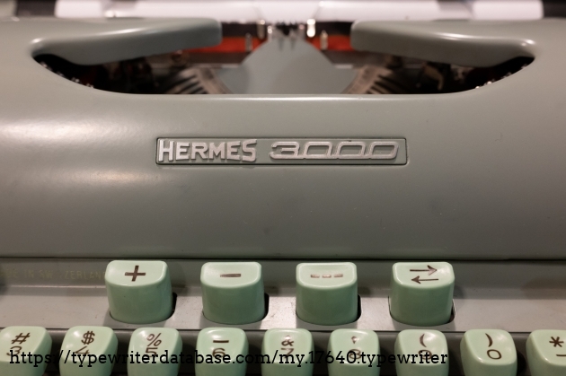 Hermes 3000 badge on the ribbon cover. Tab set, tab clear, all clear, and margin release buttons beneath it.