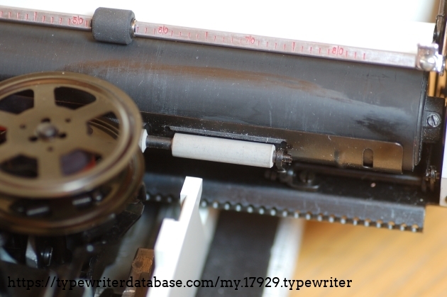 note the three different rubbers used. The paper-bail and feed rollers are still soft, but the platen is hard.