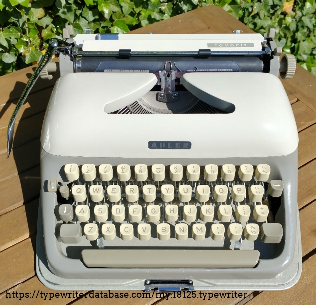 Typewriter on bottom plate