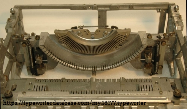 The spaceframe with the crossmember that carries the module with the linear slide to shift the the segment uo and down. the segment is up for the lower case, and down for the upper case.