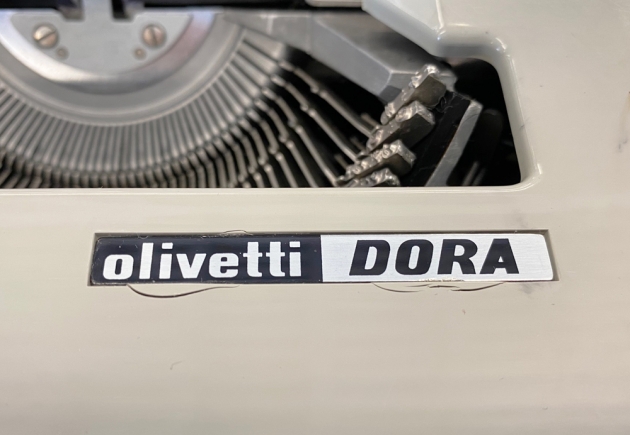 Olivetti "DORA" from the maker/model logo on the top...