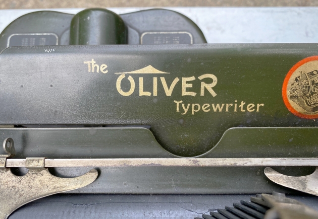 Oliver "9" from the maker logo on the top...