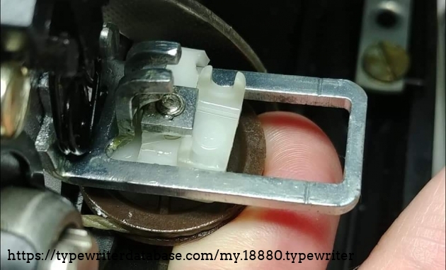 Bottom section of tabulator tensioner broke at the fork (bottom of photo).