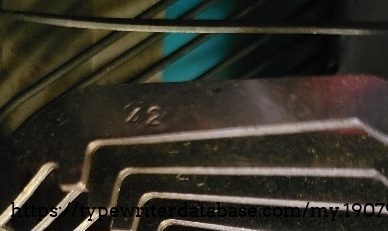 Type bars are stamped with a number.