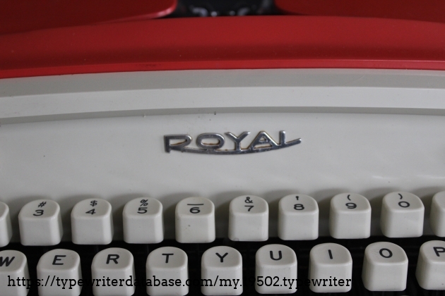 Royal brand imprint above numeral keys.