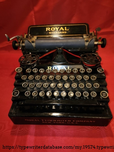 1908 Royal Standard No 1 front view  NOTE:  empty slot on the right hand 2nd row was for the optional backspace key.  This typewriter never had it.