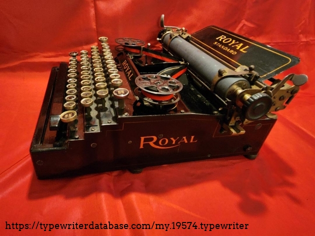 1908 Royal Standard No 1 right side view  NOTE: the empty slot on the right hand of 2nd row was for the optional backspace key.  This typewriter never had it.