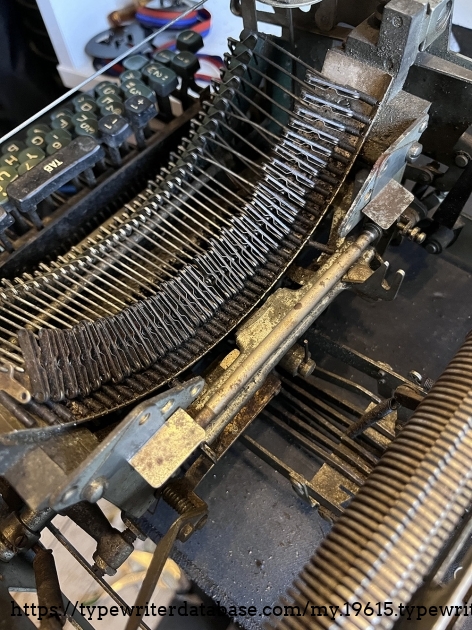 These sprung connectors are SO much easier to remove from the typebars than the c-style hardened metal clips.