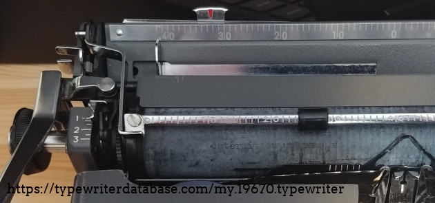 Half line spacing please! Yes.
The carriage return lever flips down for stowage. A left side carriage release lever is present as well as a separate lever for platen release.