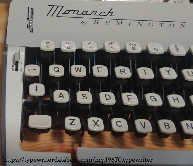 Monarch by Remington.
Three position touch control lever on the face and Tab set and clear lever left of the 4th row of keys.